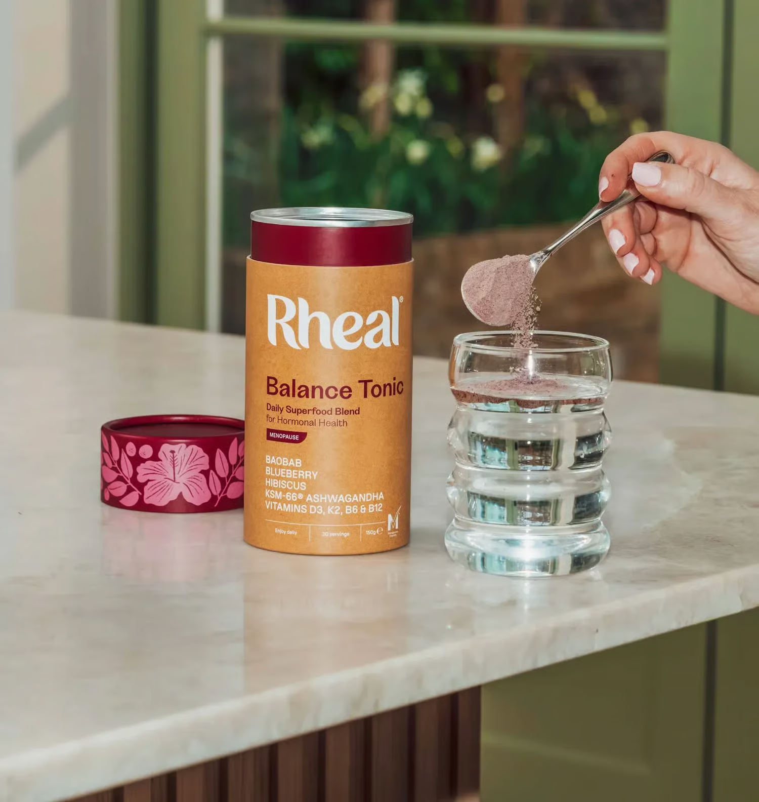 Rheal Balance Tonic Menopause tin on a kitchen counter